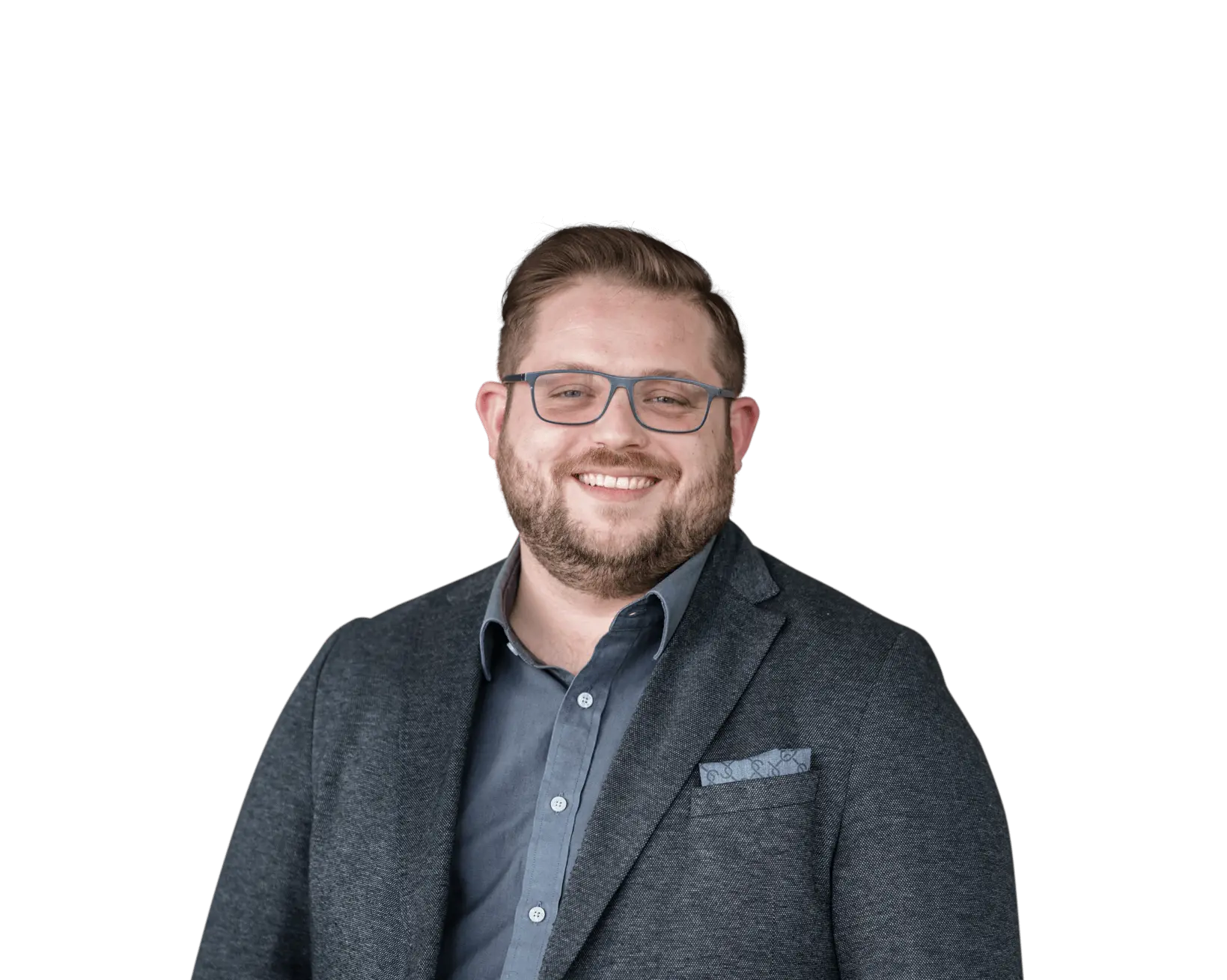 Lächelnder Mitarbeiter von Hofmann Personal im Business-Outfit.