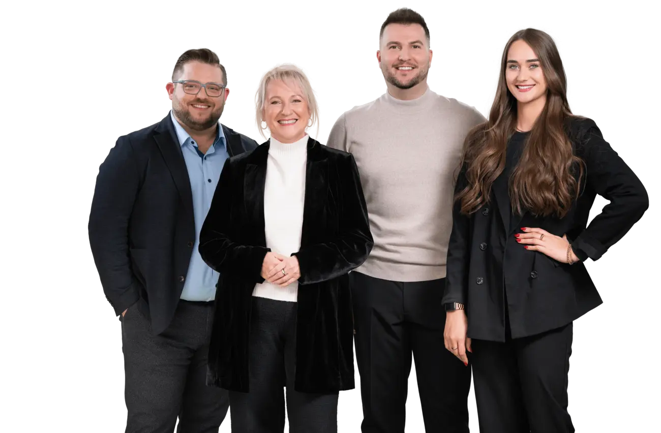 Professionelles Team in Businesskleidung, repräsentiert Zusammenhalt und Expertise bei Hofmann Personal. 