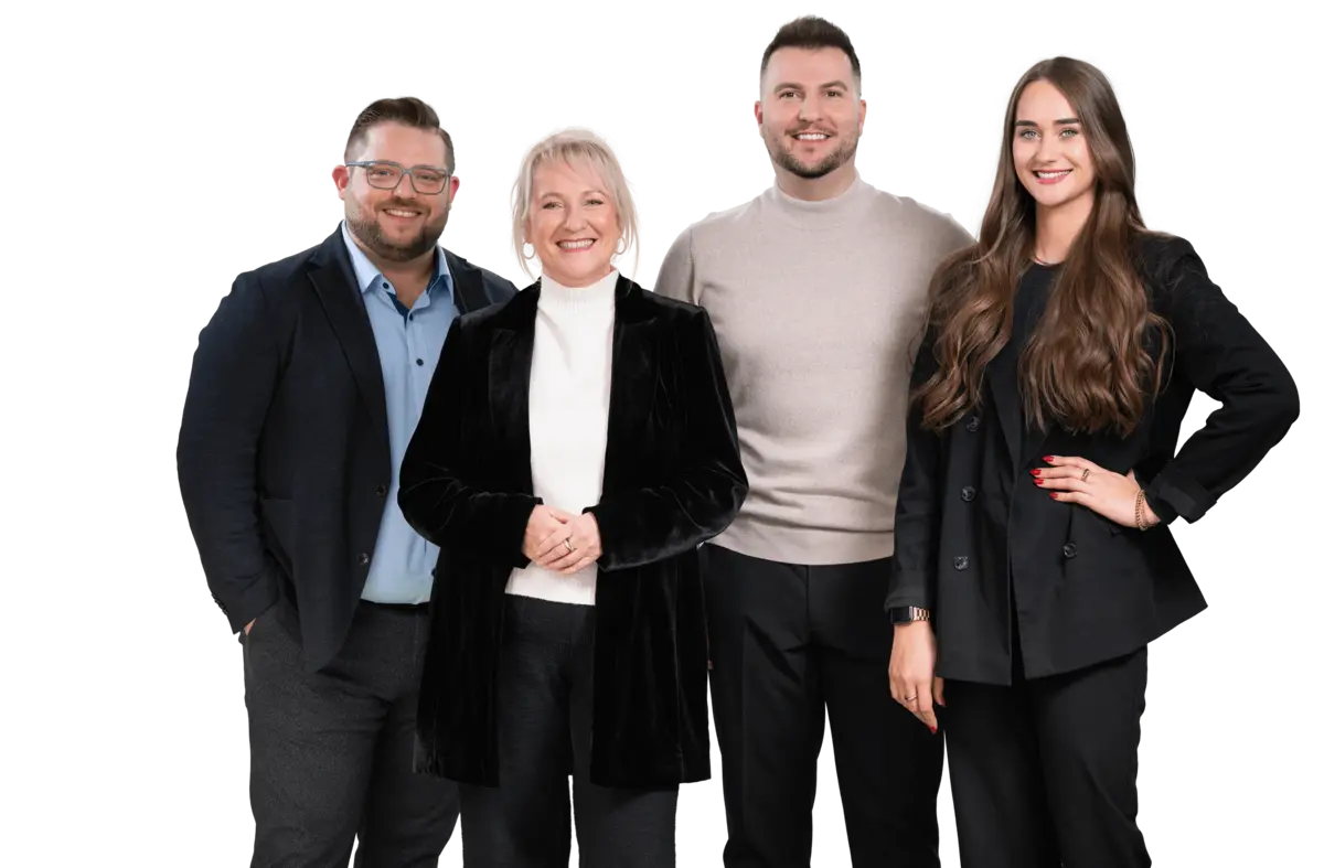 Professionelles Team in Businesskleidung, repräsentiert Zusammenhalt und Expertise bei Hofmann Personal. 