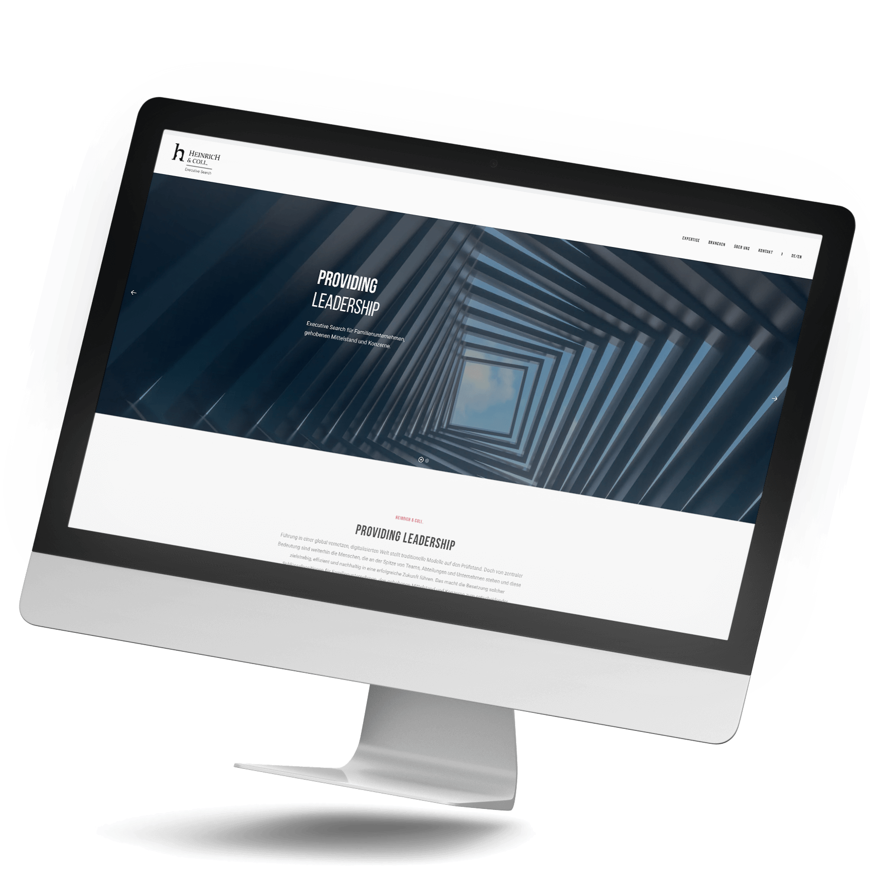 Mockup eines Desktops der Heinrich & Coll. Website. Fokus liegt auf der Executive Search.