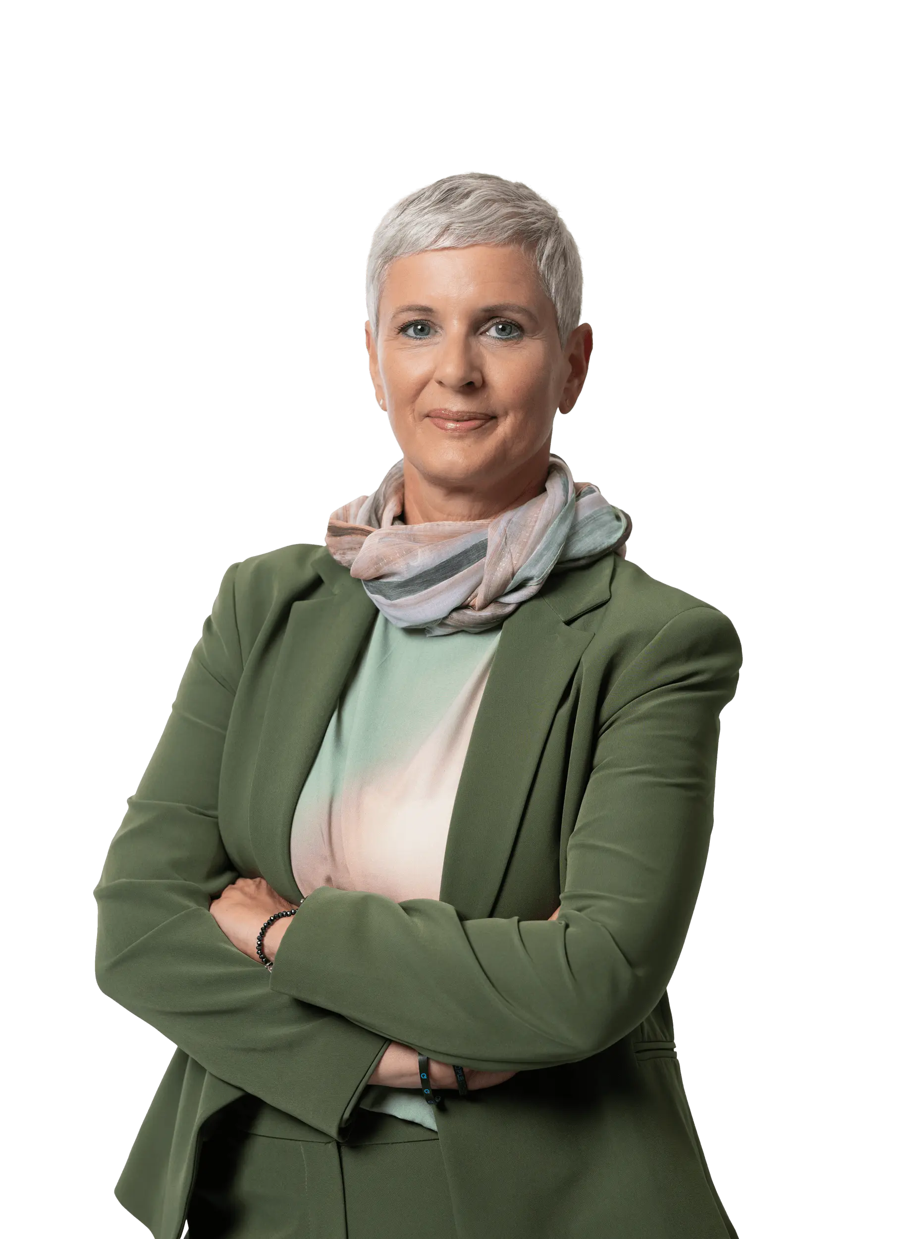 Mitarbeiterin in grünem Blazer mit Schal, symbolisiert Professionalität und Kompetenz bei Hofmann Personal.