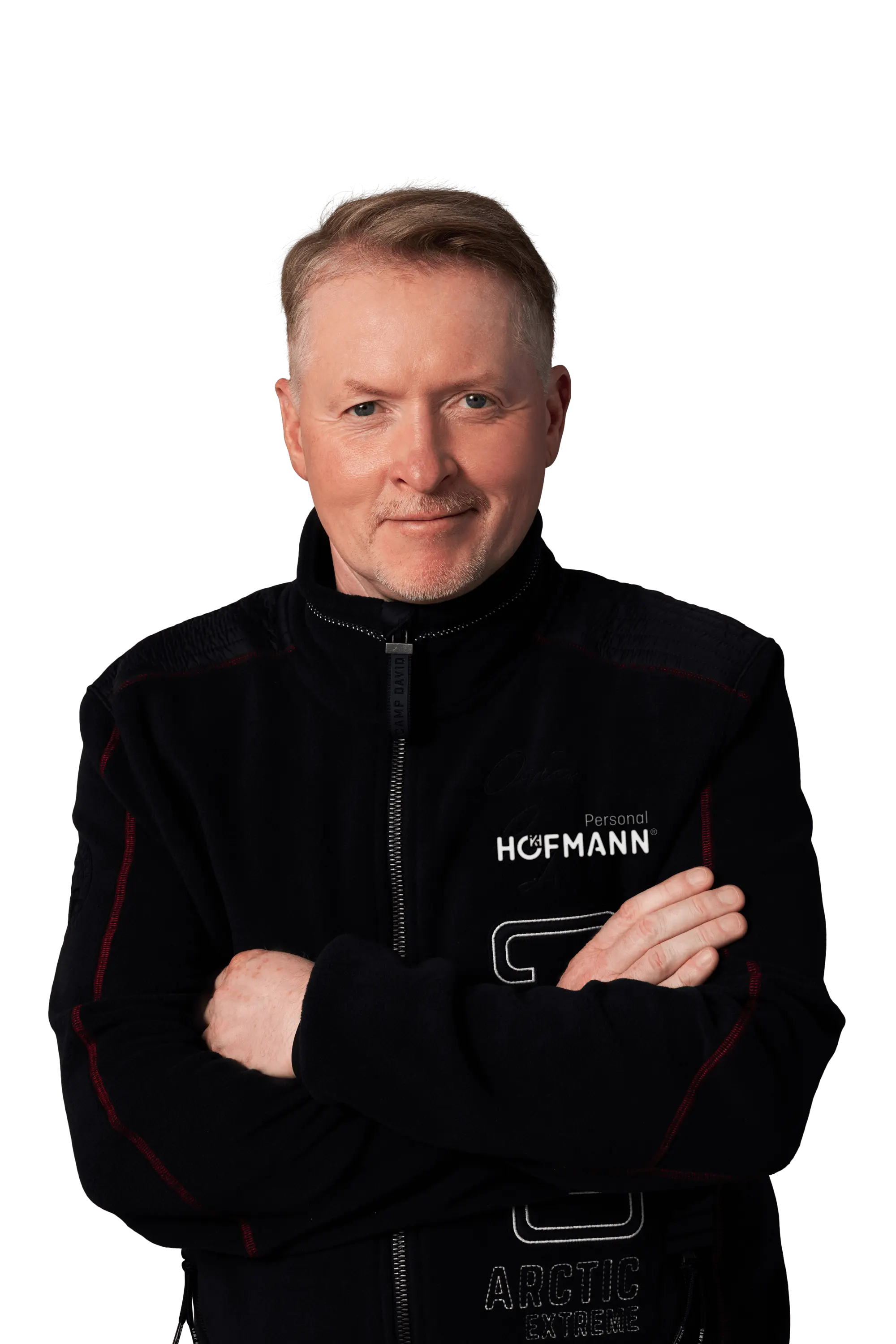 Joey Kelly mit verschränkten Armen in schwarzem Pullover, Markenbotschafter von Hofmann Personal