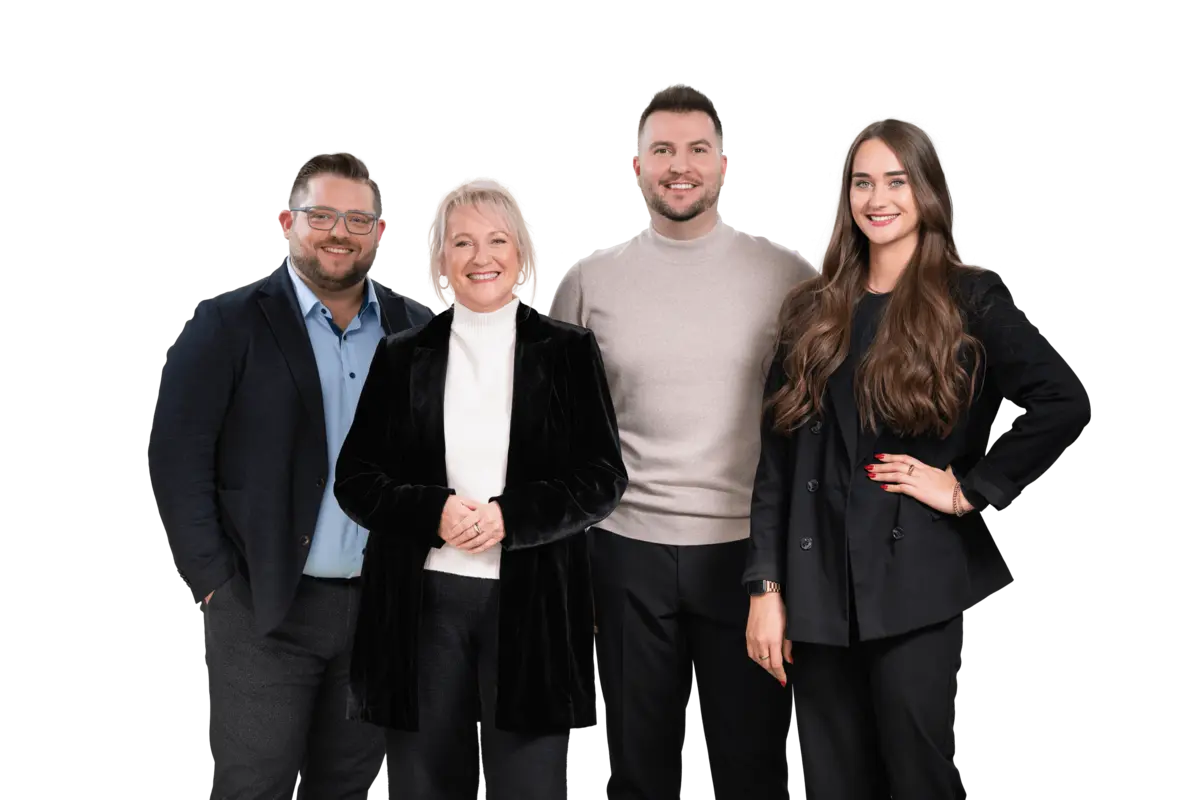 Professionelles Team in Businesskleidung, repräsentiert Zusammenhalt und Expertise bei Hofmann Personal. 